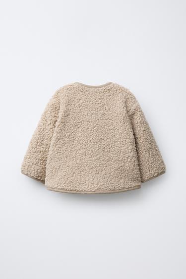 BLOUSON EFFET MOUTON AVEC BRANDEBOURGS - Beige de Zara - Image 1