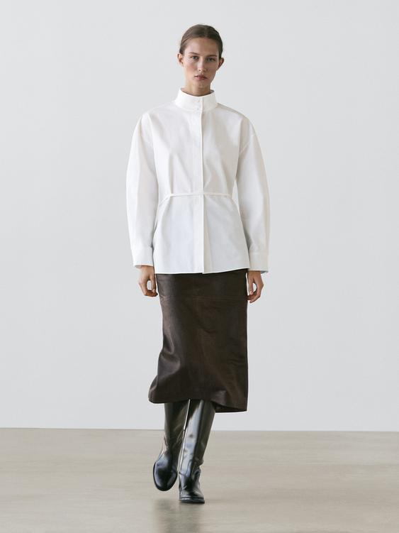 High neck shirt with strap detail