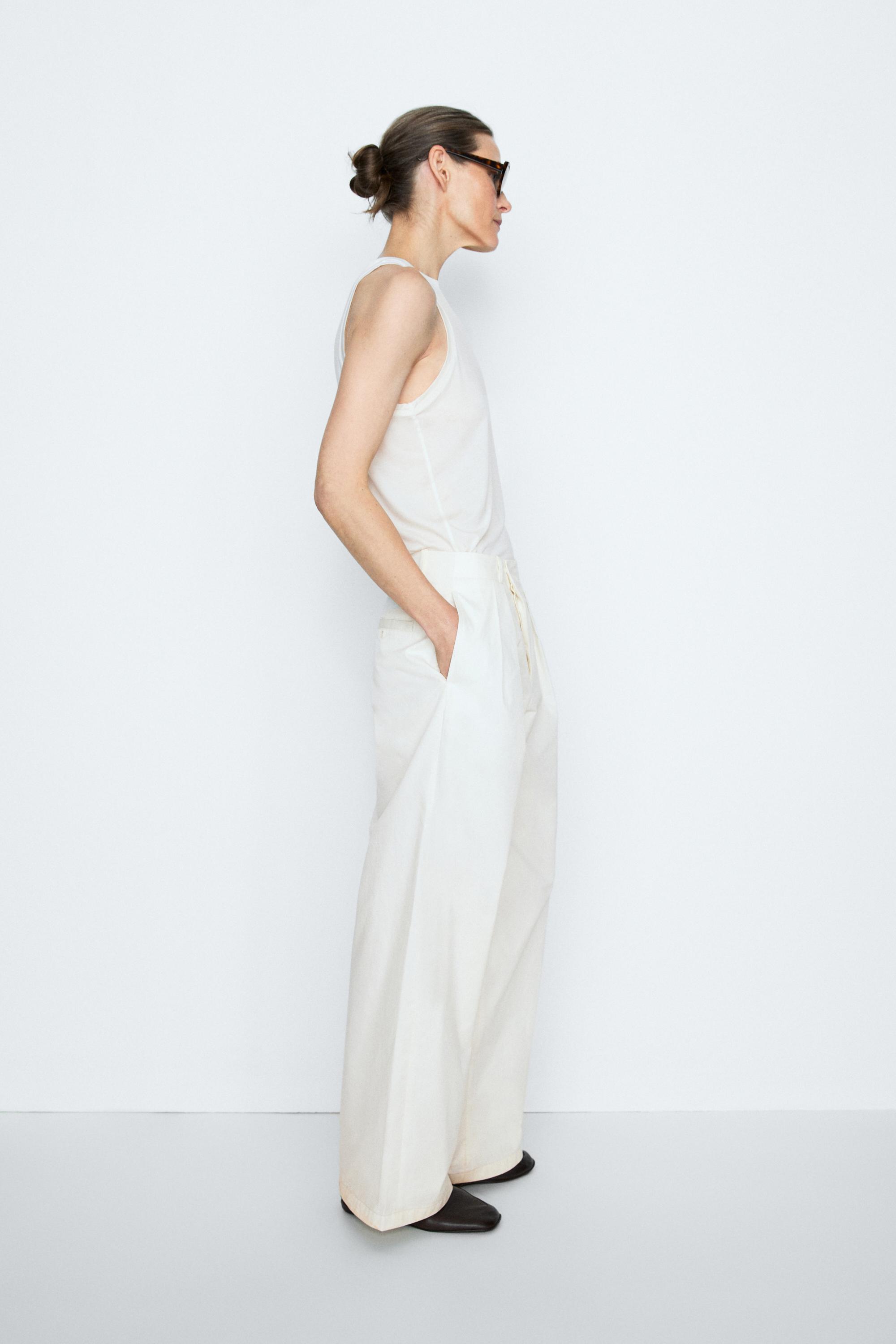 Pleated pants with crossover fastening detail - STUDIO — Ecru