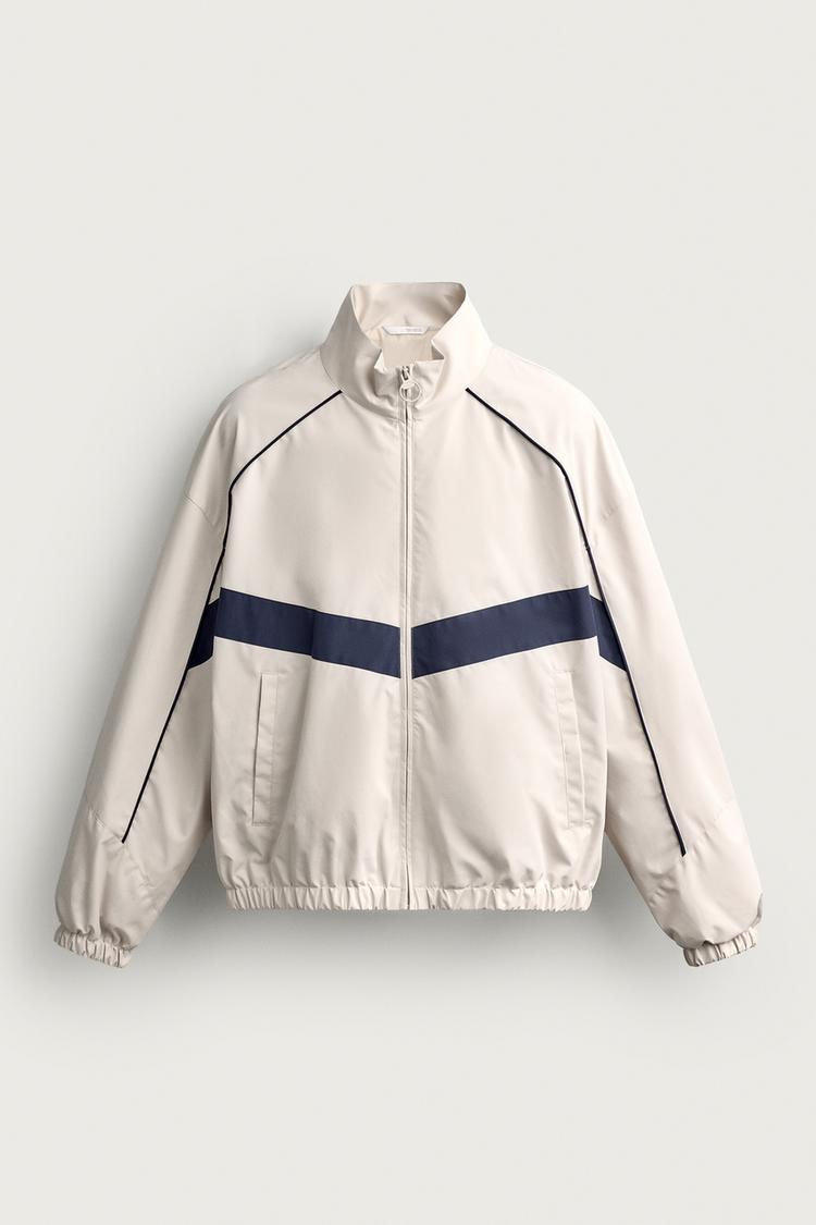 Chaqueta técnica repelente al agua con contraste 7