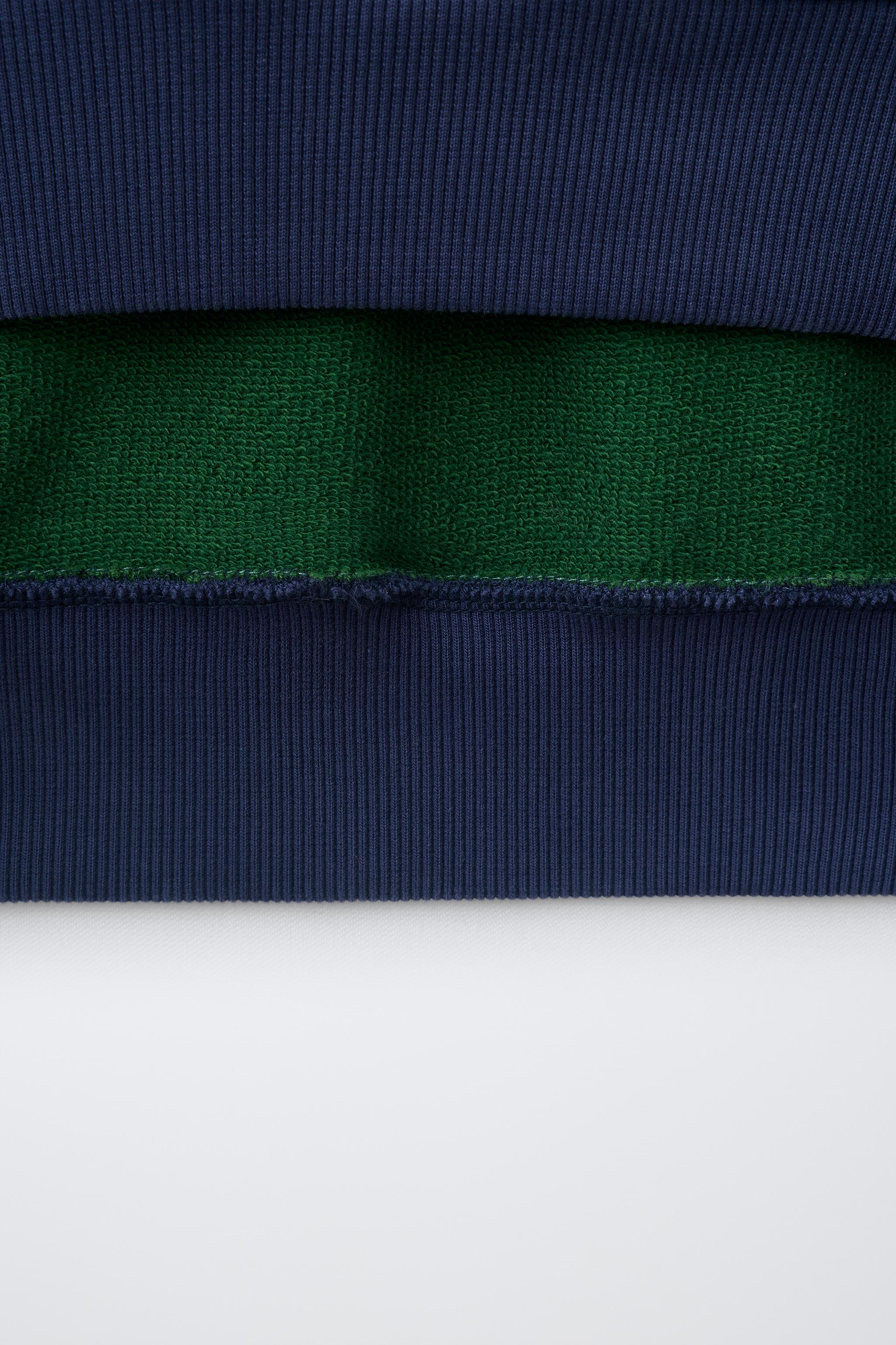 EMBROIDERED PATCH SWEATSHIRT