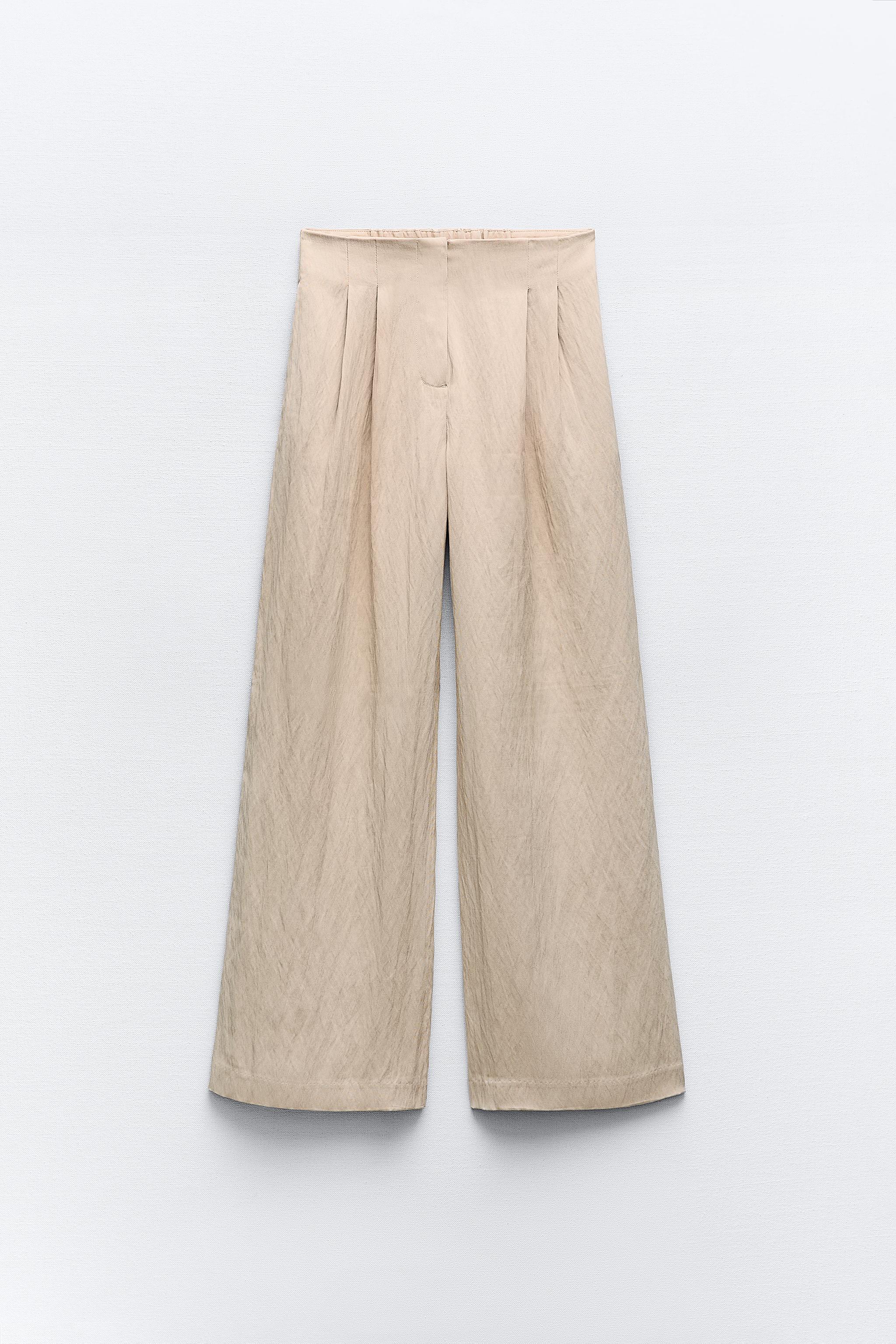 FLOWY PLEATED PANTS