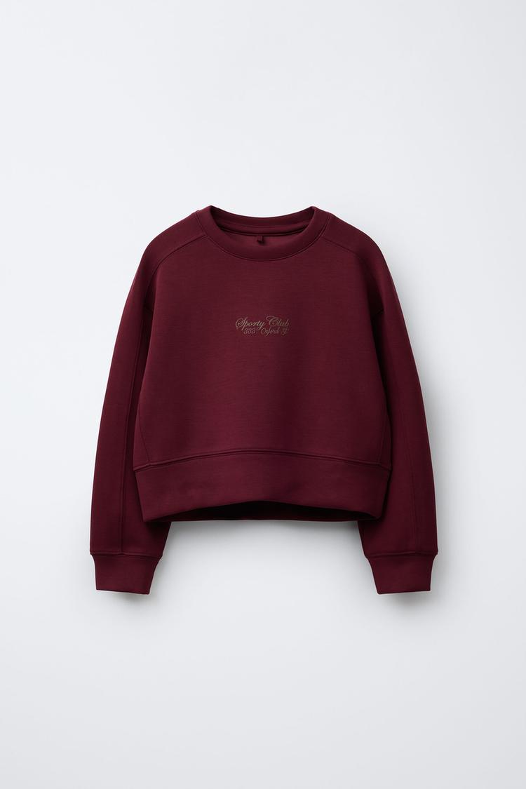 SWEATSHIRT WITH RAISED TEXT PRINT