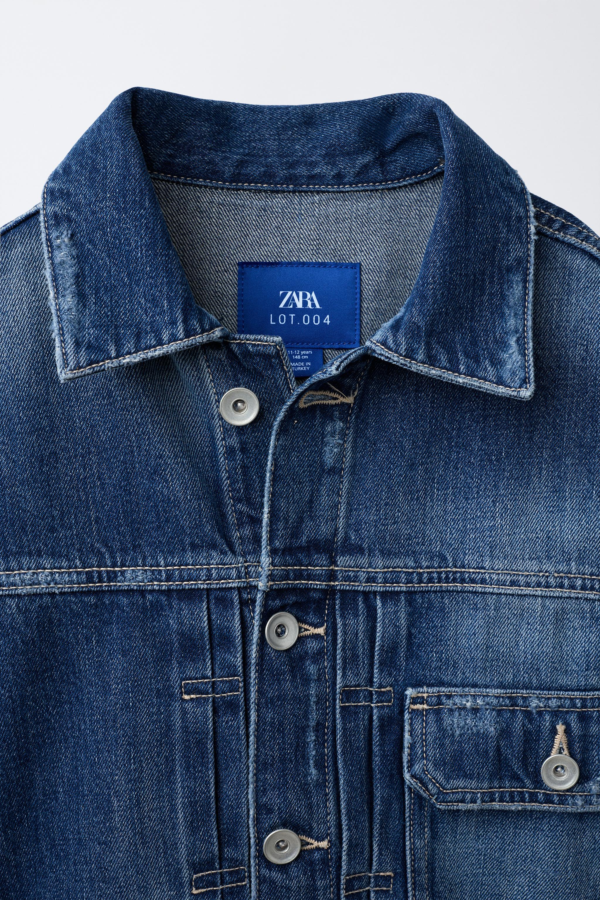 DENIM JACKET WITH BUCKLE