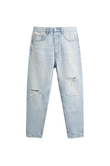 RIPPED JEANS WITH PATCHES