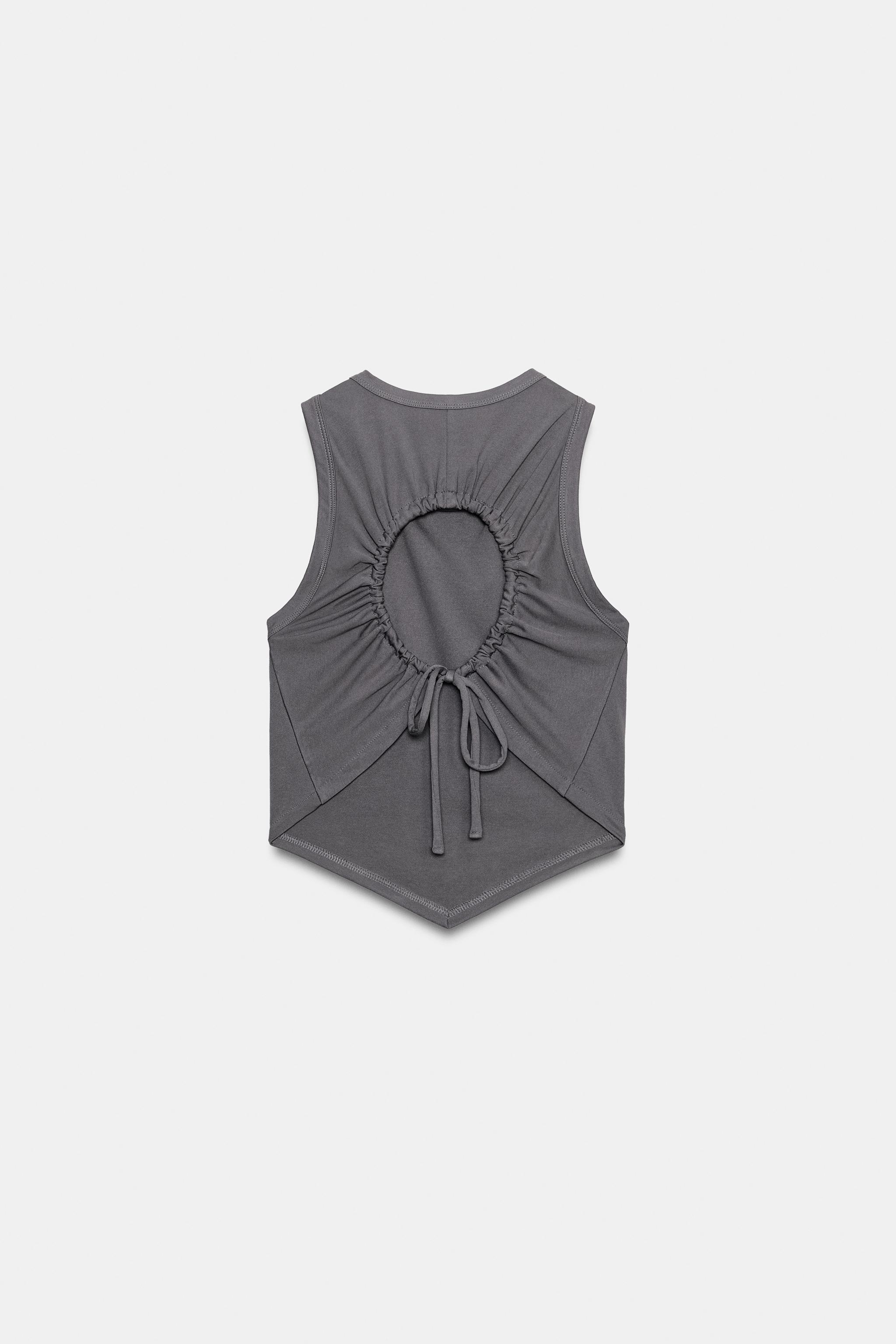 FLOWY TOP WITH BACK OPENING