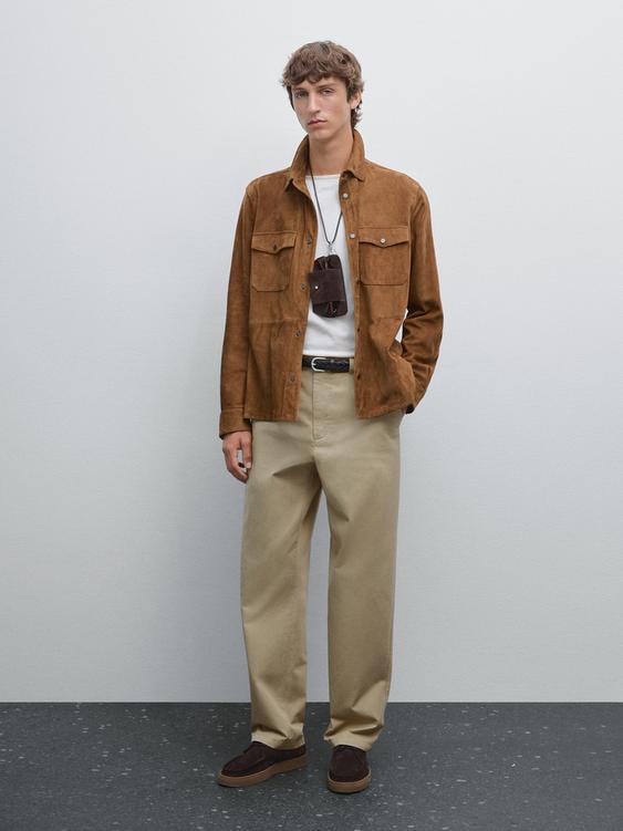 Trousers with patch pocket