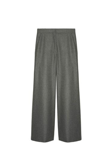 High-waisted gray wide-leg pants, with front pleats and a straight cut, on a white background.