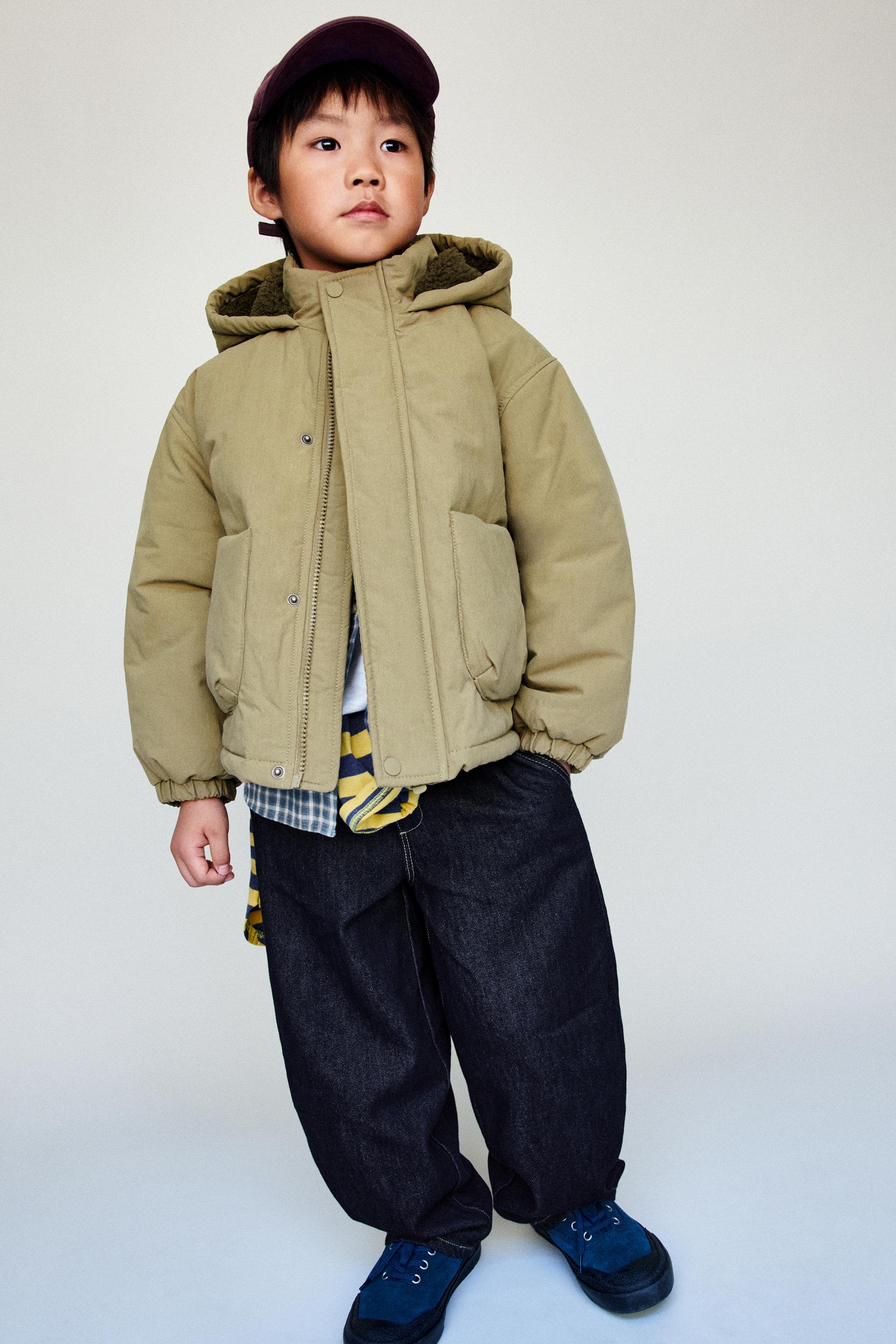 BLOUSON À CAPUCHE EFFET MOUTON