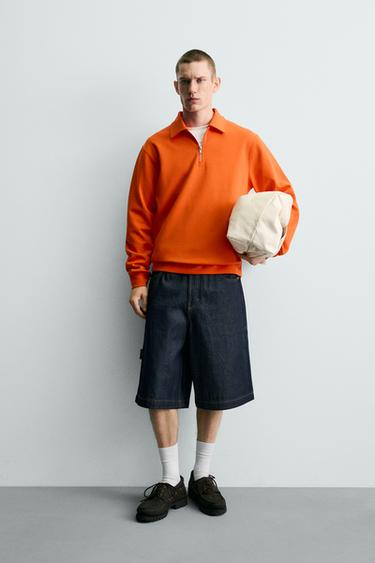 POLO SWEATSHIRT MET INTERLOCK EN RITS - Oranje van Zara