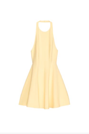 Front view of a sleeveless, light yellow dress with a round neck.