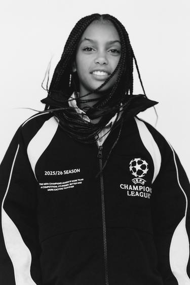 CAZADORA WATER REPELLENT CAPUCHA UEFA CHAMPIONS LEAGUE ® - Negro de Zara