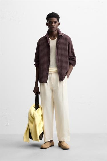 PLEATED CHINO TROUSERS - Ecru by Zara - Image 0