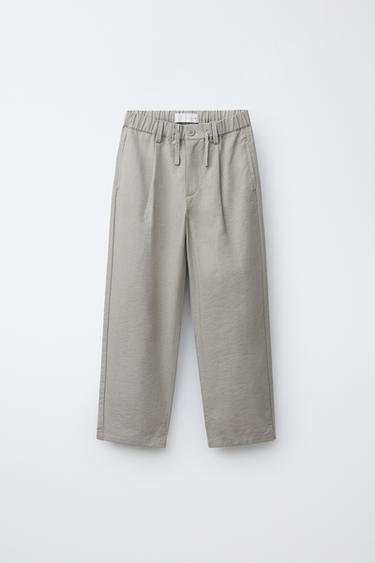 PANTALÓN FLUIDO PINZAS - Gris / Tostado de Zara
