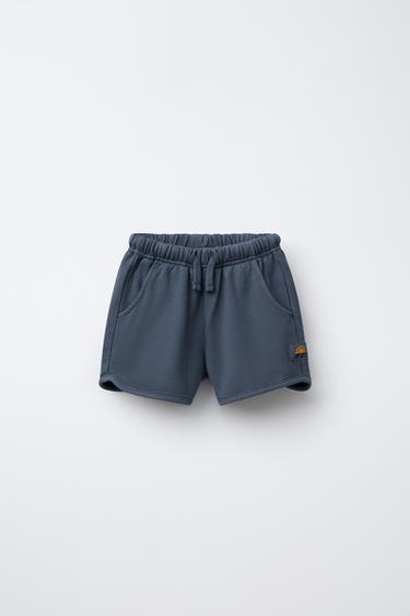 STRAIGHT-FIT-BERMUDASHORTS AUS JERSEY – GARMENT DYED MIT ETIKETT - Marineblau von Zara