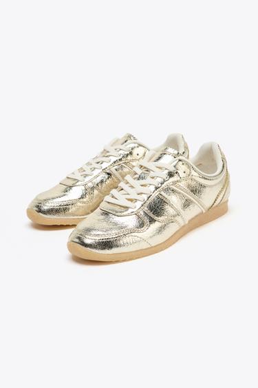 METALLIC-EFFECT TRAINERS - Gold by Zara - Image 1
