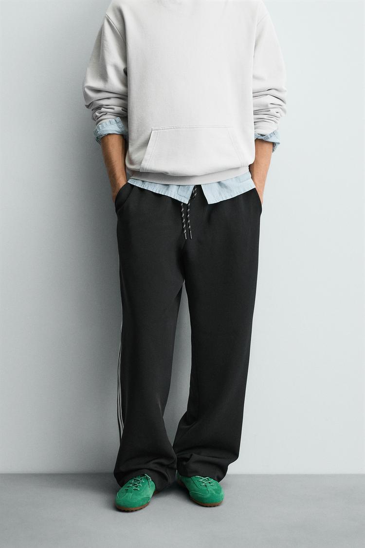 WIDE FIT JOGGER PANTS WITH SIDE STRIPES