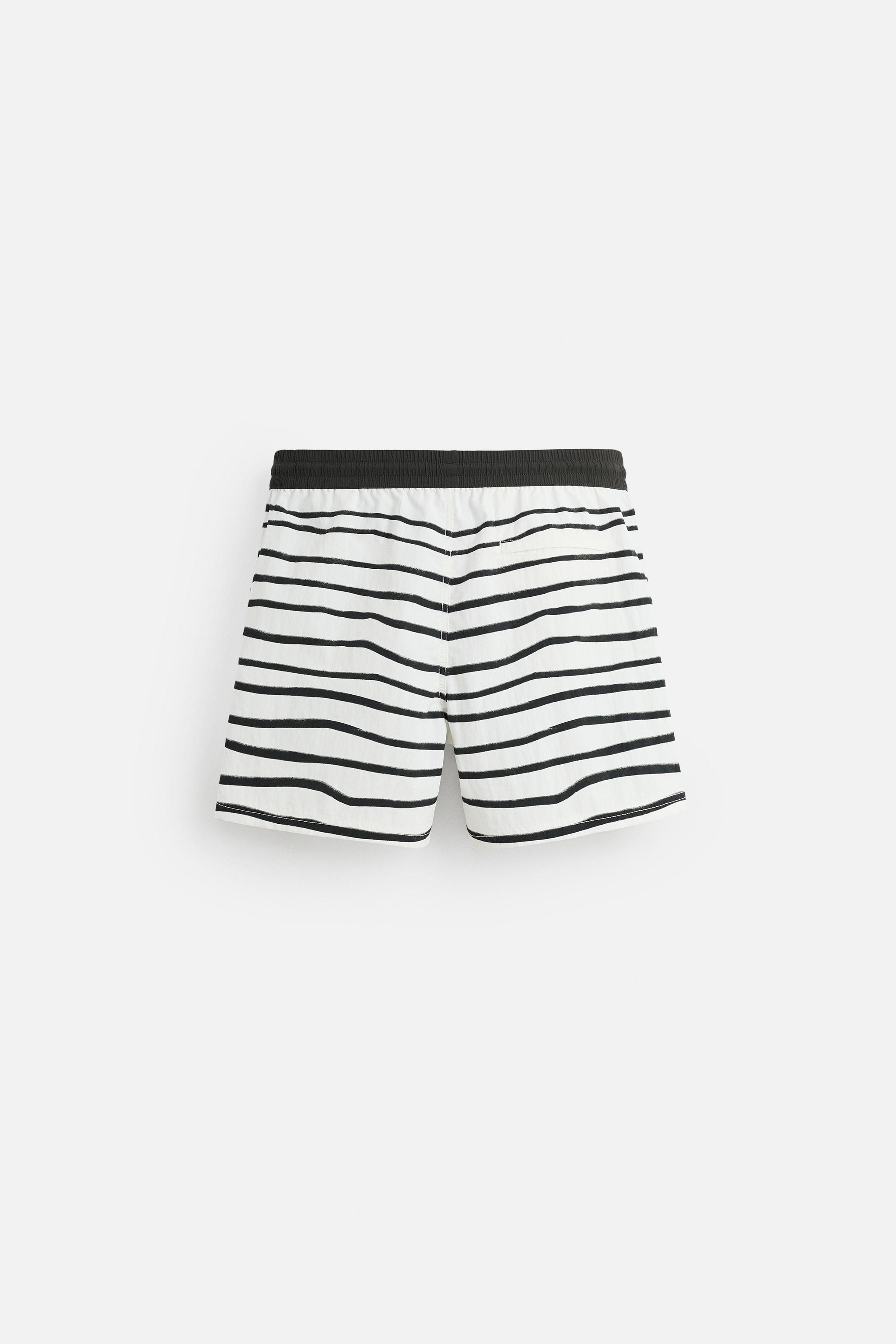 OTIS KWAME KYE QUAICOE PRINTED MID-LENGTH SWIMSUIT