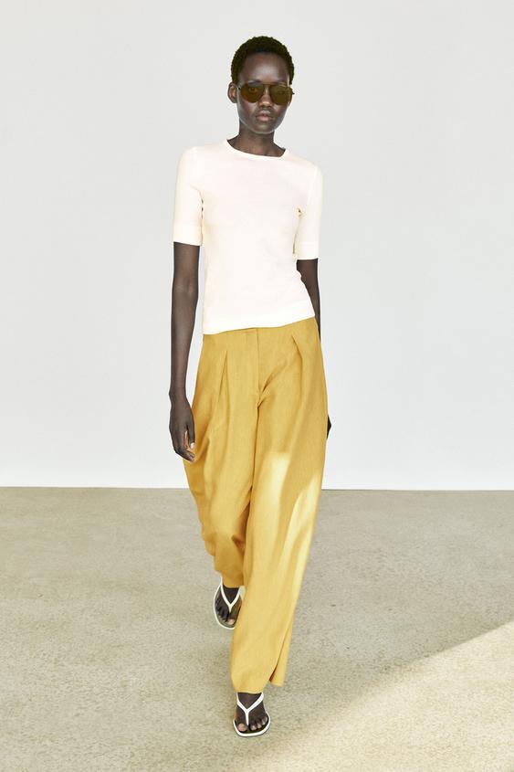 Pantalón fluido ancho pliegues con lino - Mostaza de Zara - Imagen 0