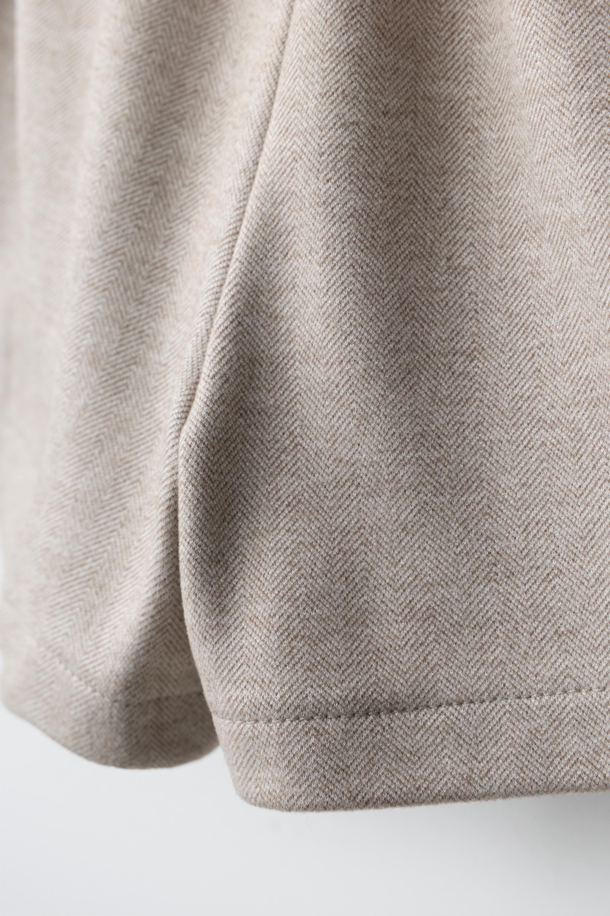 SHORT STRUCTURE JUPE PLIS PLATS LACETS