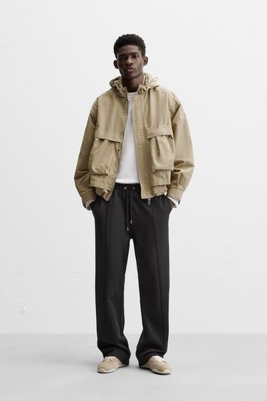 БРЮКИ ДЖОГГЕРЫ С ДЕКОРАТИВНЫМИ ШВАМИ — ЧЕРНЫЙ от Zara — изображение 0