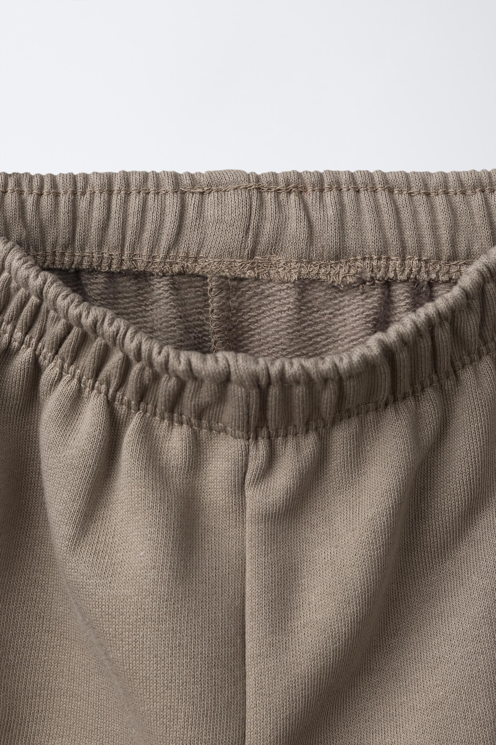 ENSEMBLE DE JOGGING SWEAT RAYURES ET PANTALON WIDE LEG