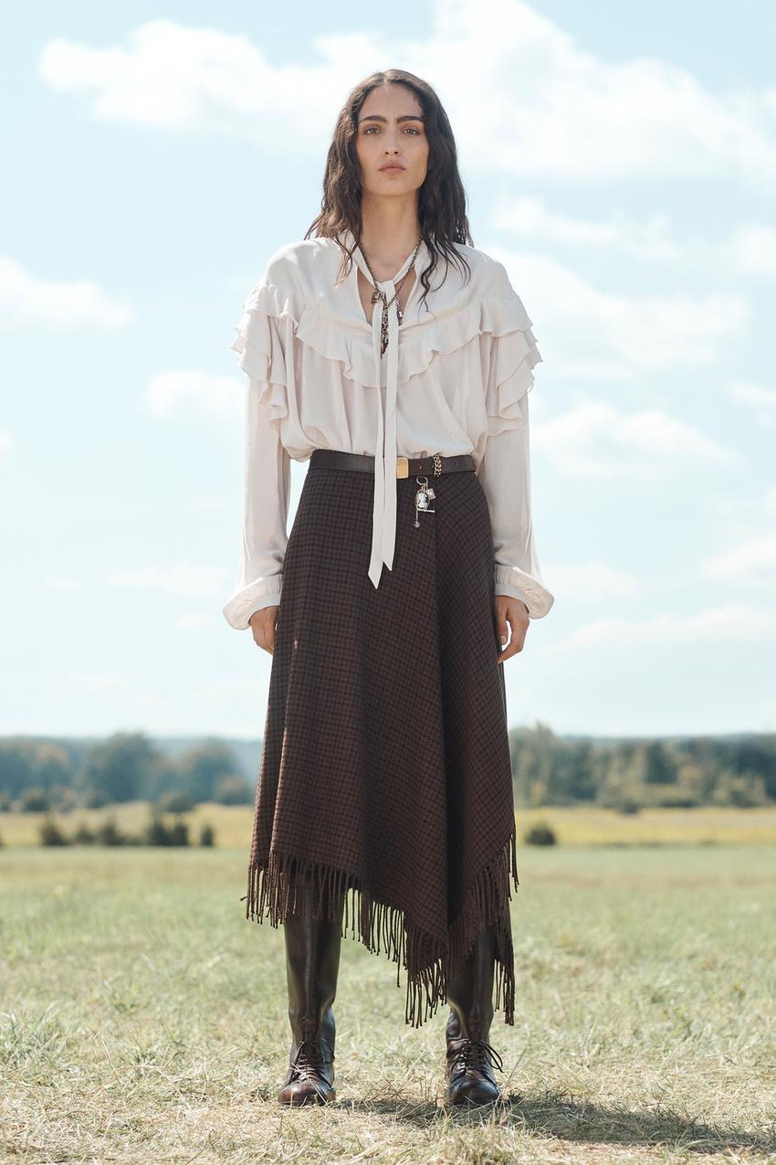 LIMITED EDITION ASYMMETRIC HEM FRINGED SKIRT