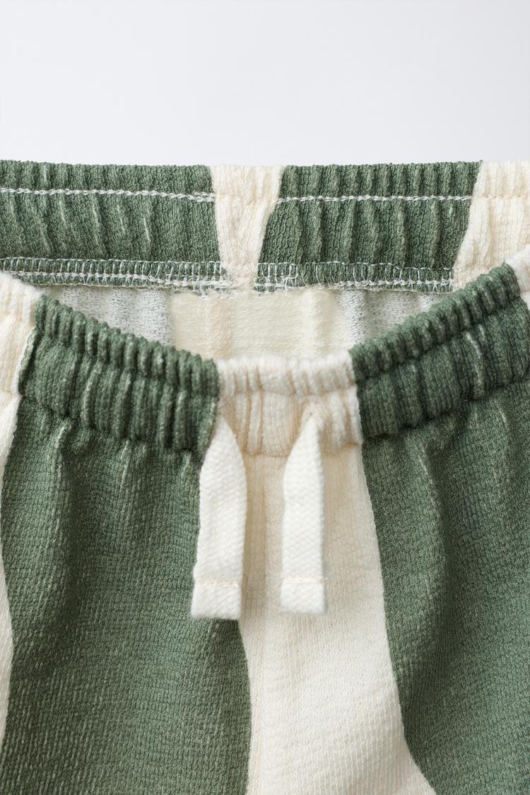 CONJUNTO DE CAMISETA Y BERMUDA CON ONDAS A BLOQUES DE COLOR 4