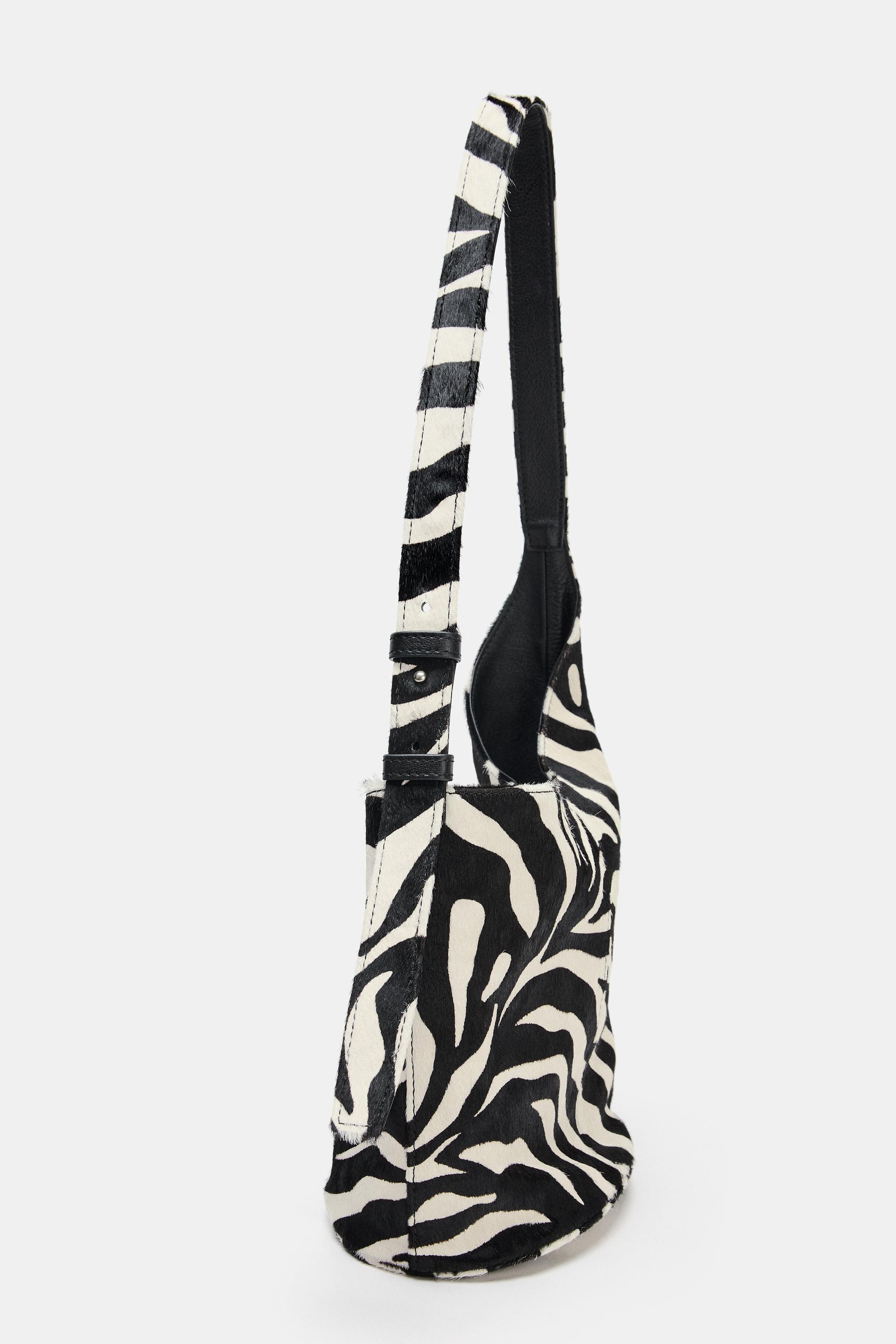 ASYMMETRIC SOFT LEATHER MINI BUCKET BAG