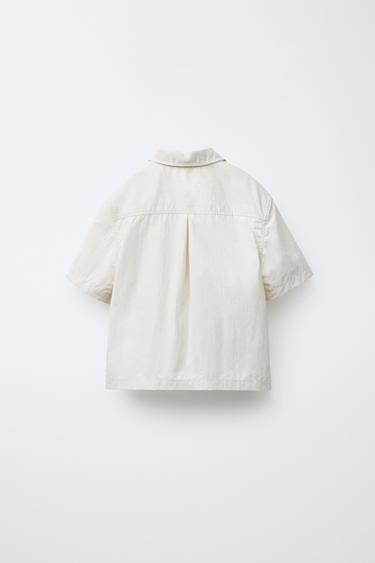 CHEMISE TECHNIQUE À POCHE EN CONTRASTE - Écru de Zara - Image 1