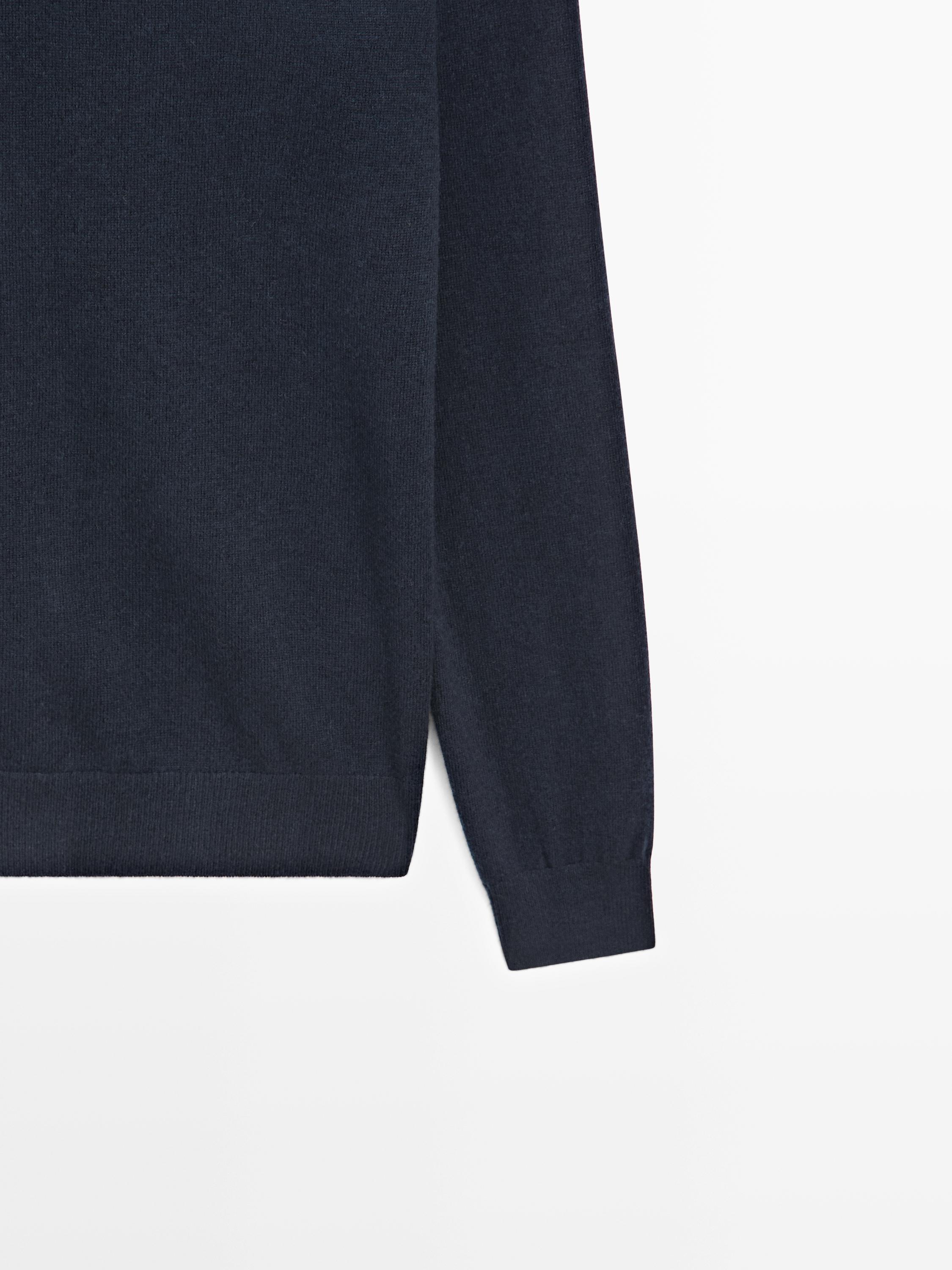 Pull à col montant en maille de laine mélangée