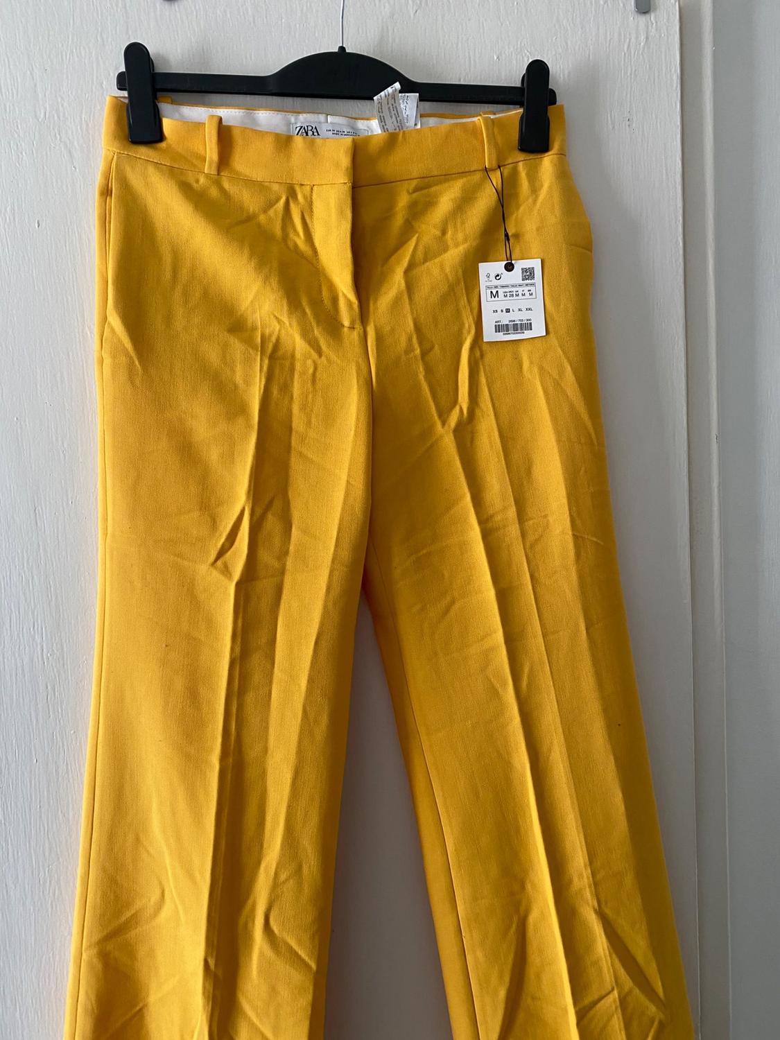 FLARED TROUSERS