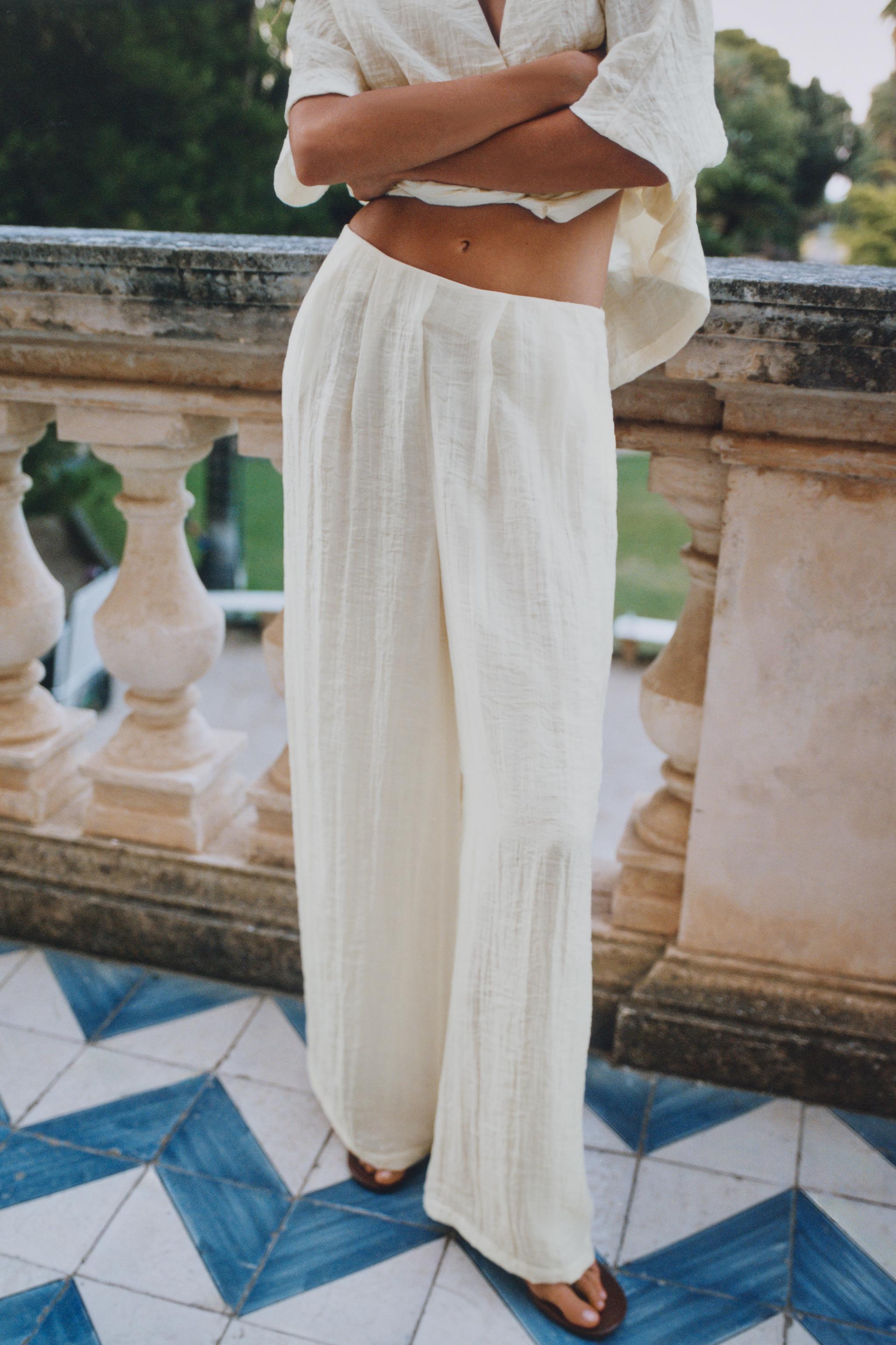 PLEATED WIDE LEG PANTS — Ecru