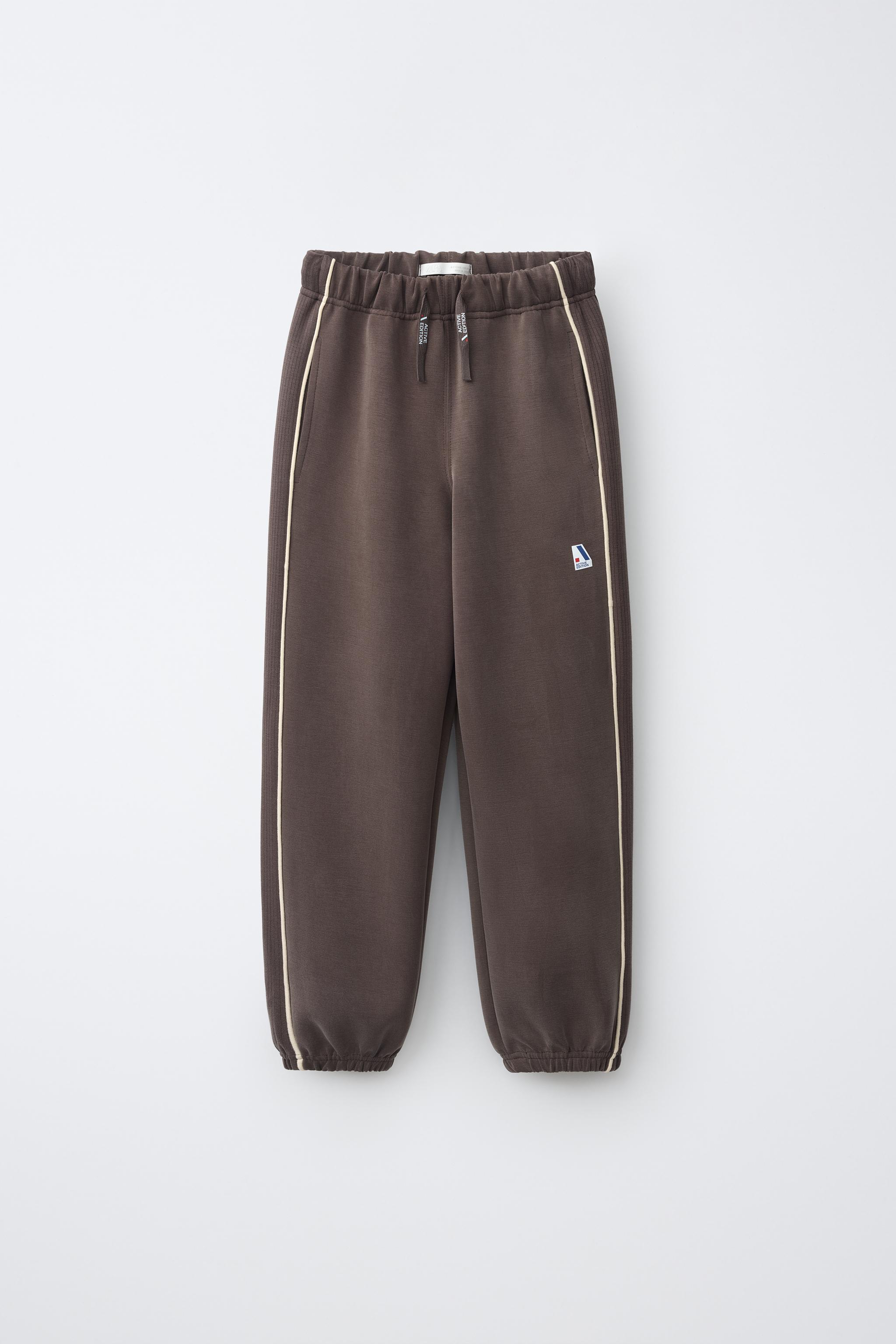PANTALON SPORTY À LISERÉ CONTRASTÉ