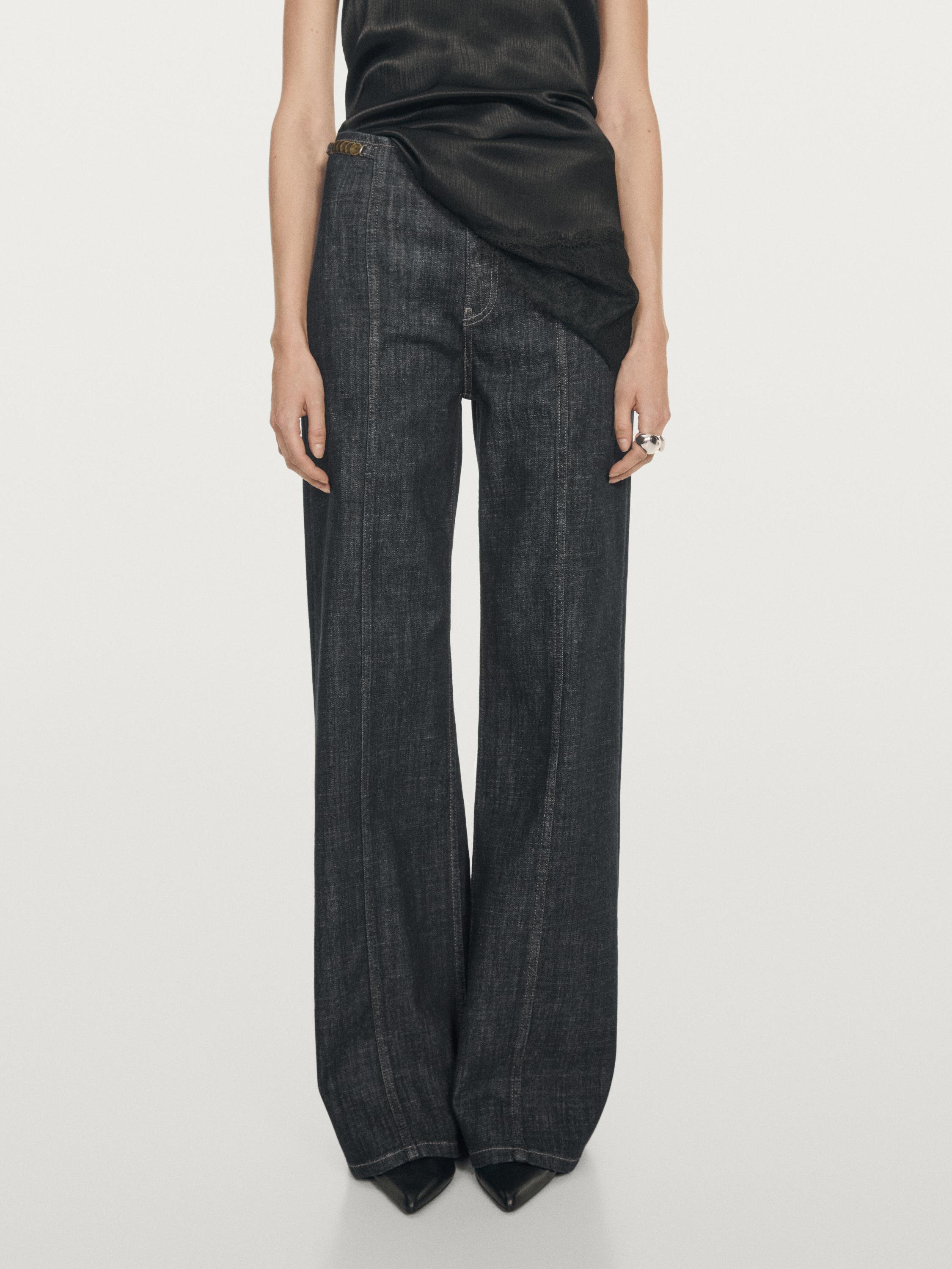 High-waist wide-leg jeans with chains