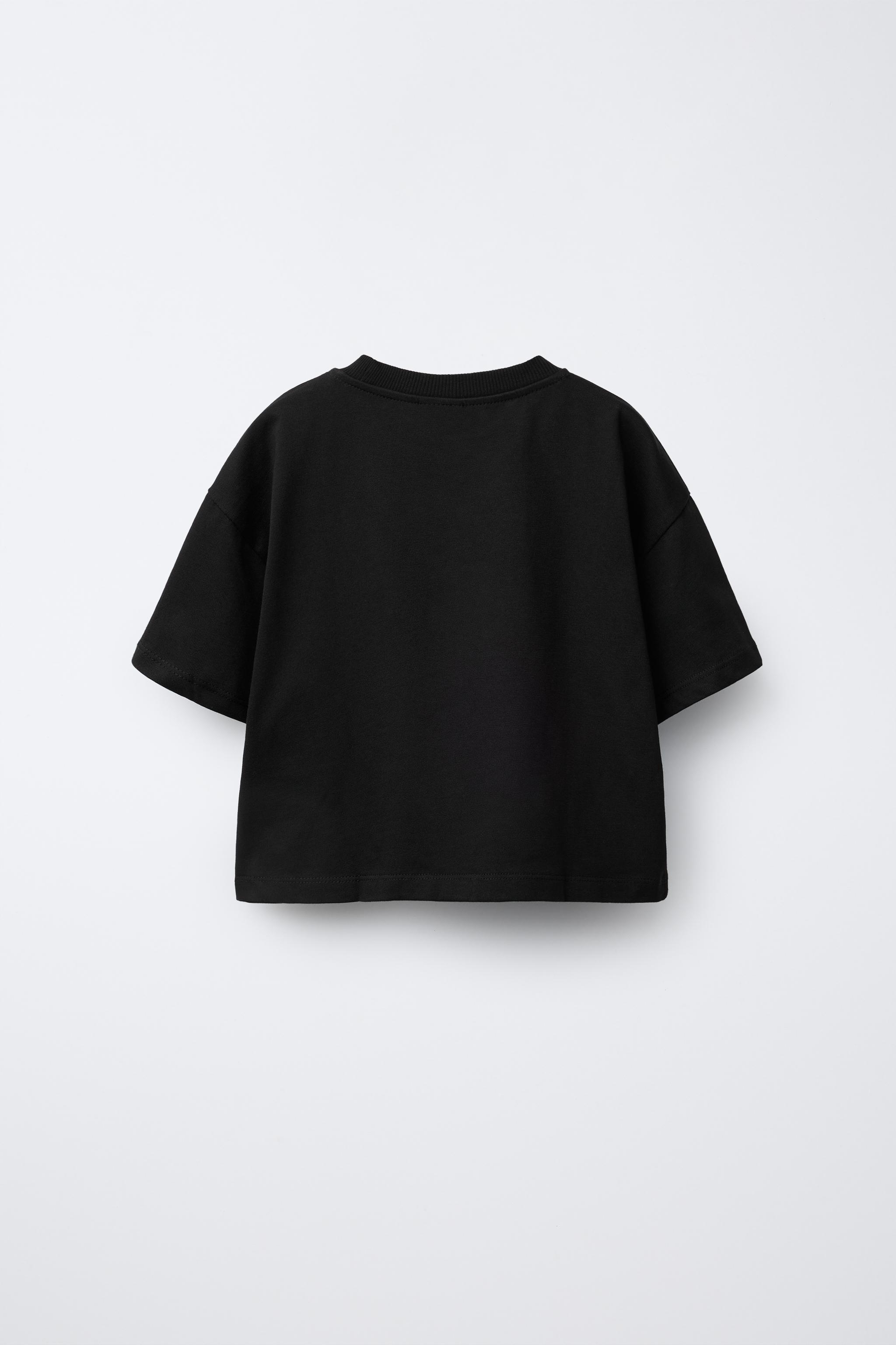 Tシャツ・カットソー ETMON Frill One Shoulder TShirt, Black T-shirt with shoulder buttons | Gaudì
