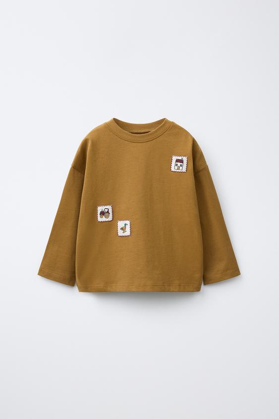 CAMISETA PARCHES CASITAS - Ocre de Zara - Imagen 0