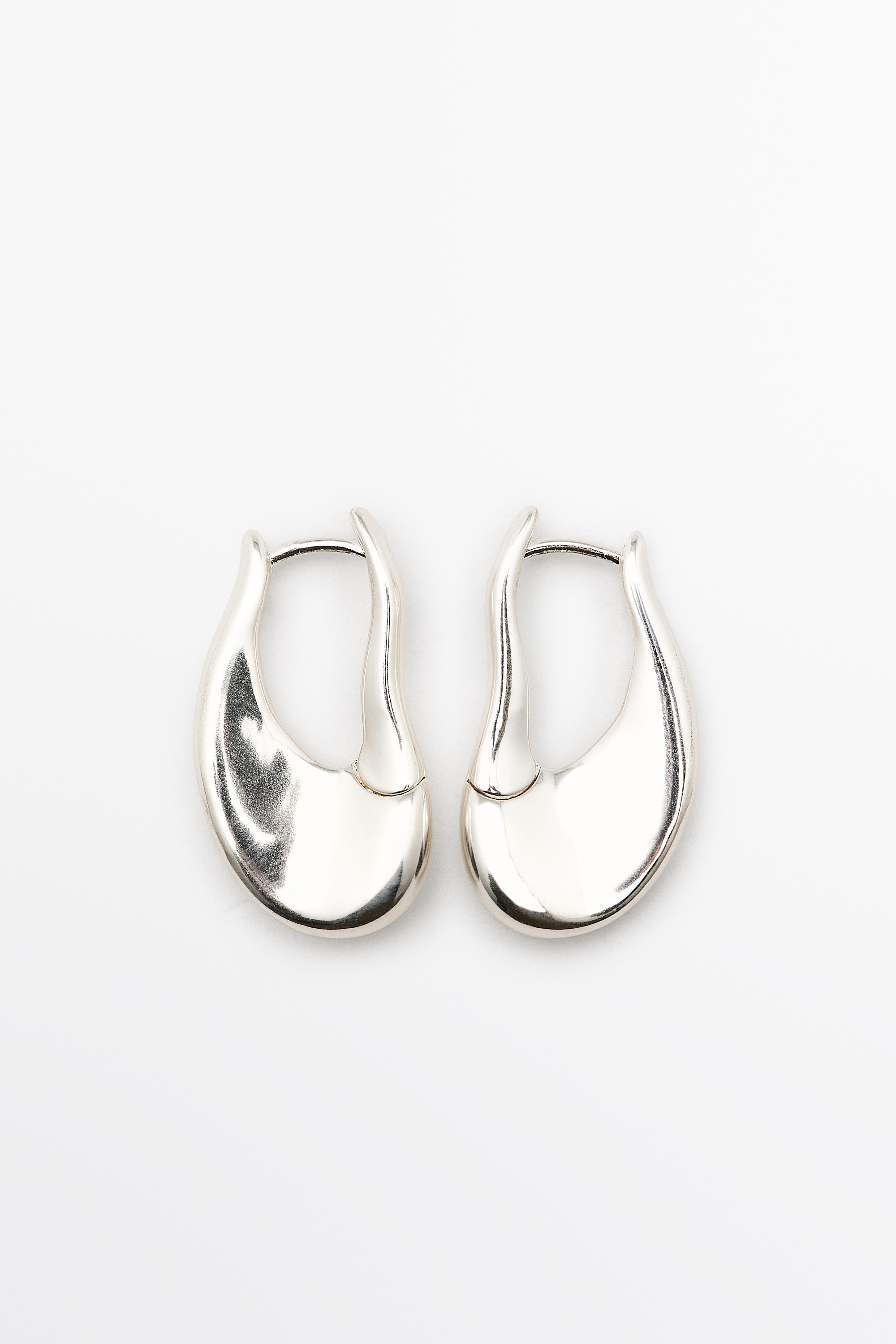 Boucles d’oreilles créoles lignes fluides