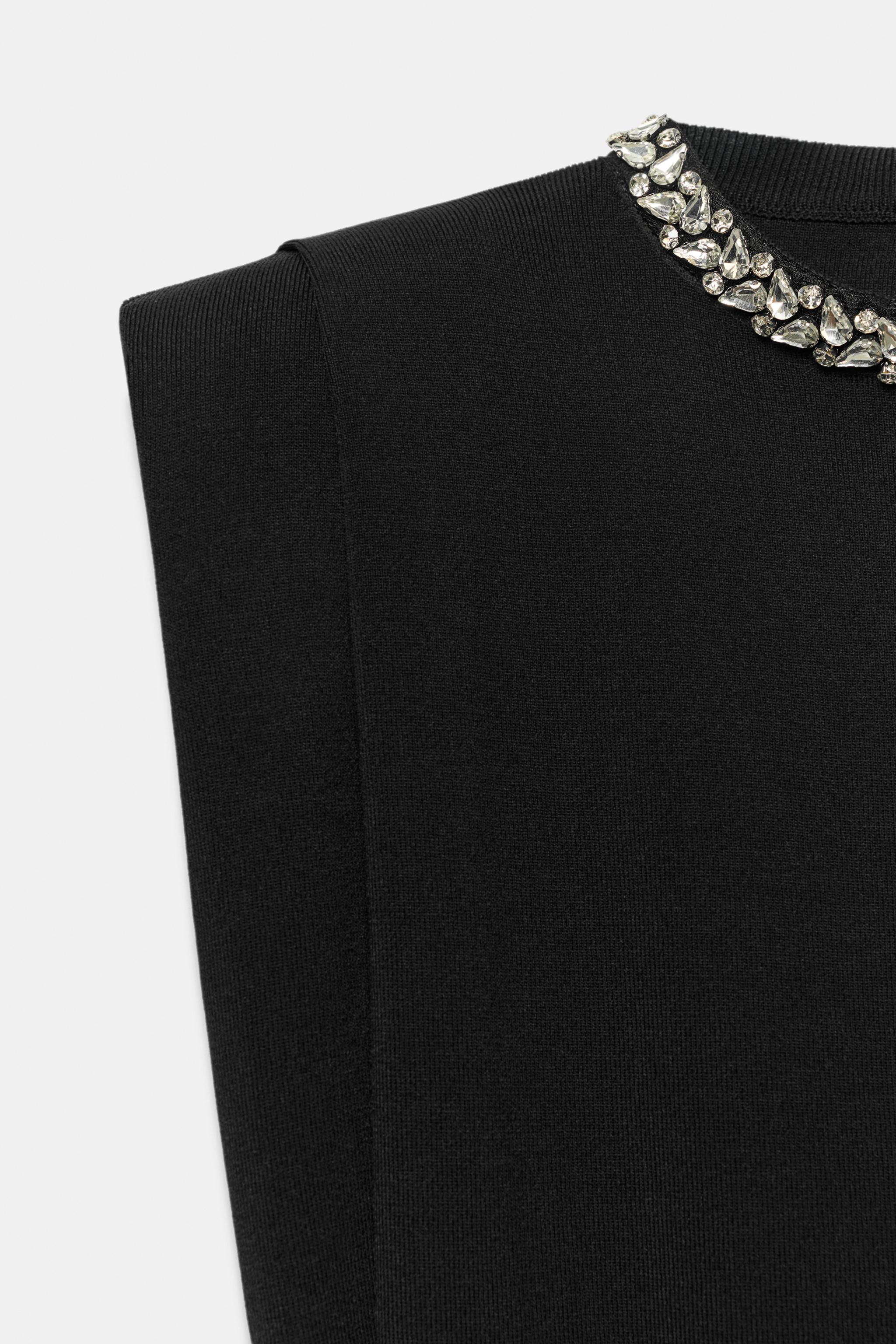 JEWEL NECK SHOULDER PAD TOP