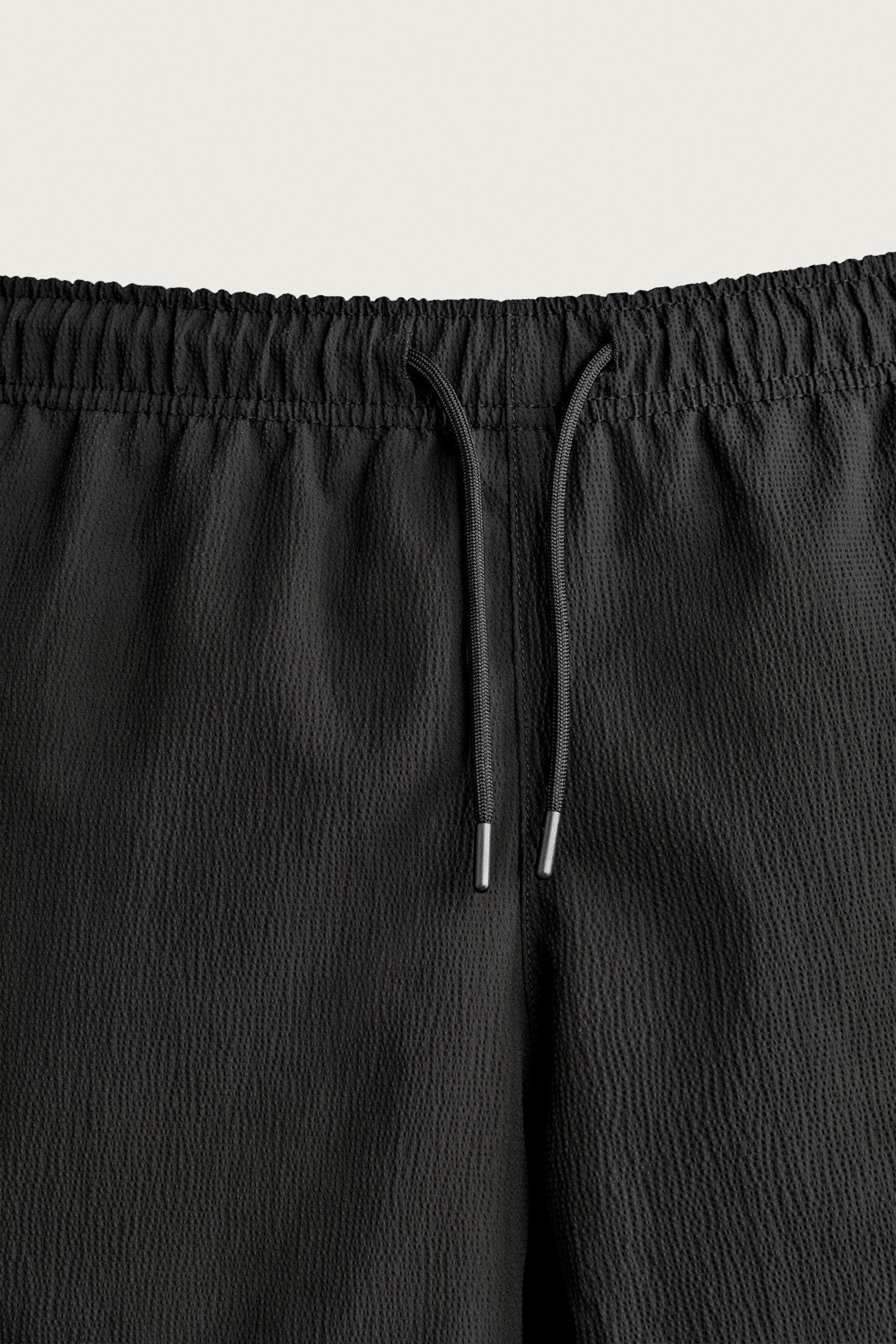 TEXTURED MID-LENGTH SWIMSUIT