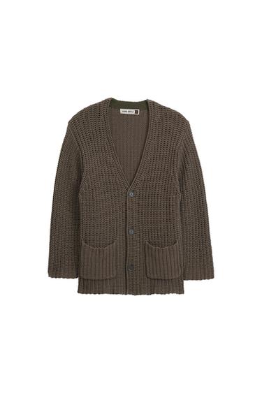 Brown chunky knit cardigan with buttons and front pockets. Visible inside label with text: "ZARA SRPLS".