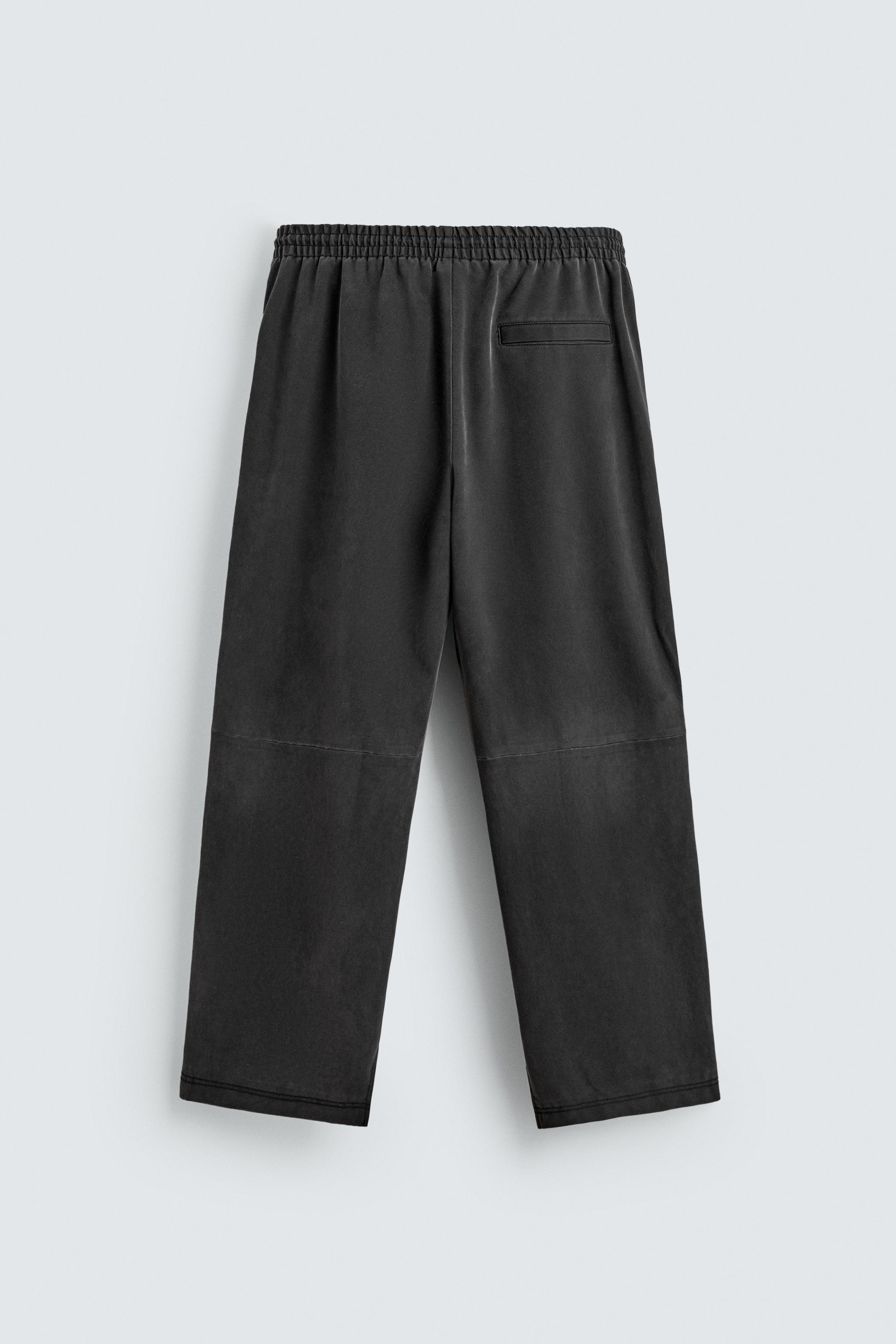STUDDED FAUX LEATHER RELAXED FIT PANTS