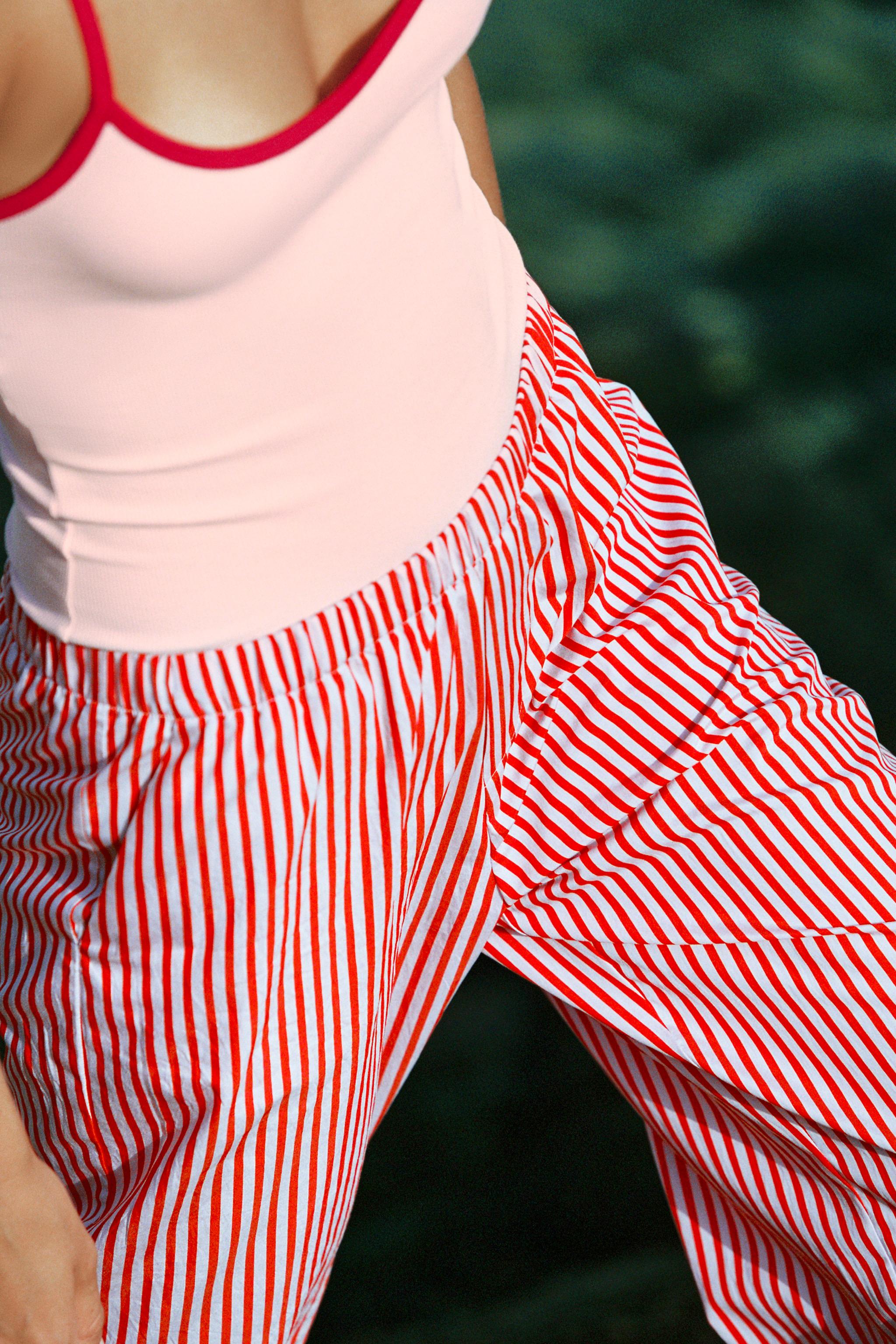 CONTRAST TRIM BODYSUIT