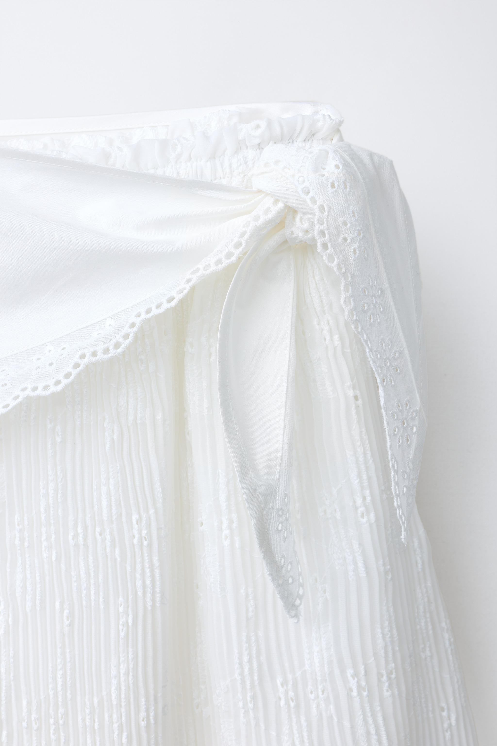PLEATED MIDI SKIRT WITH SCARF DETAIL