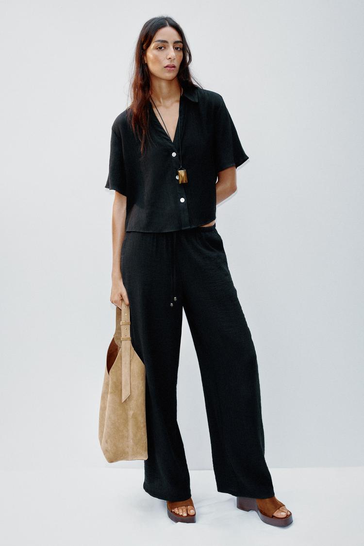 WIDE-LEG TROUSERS WITH ELASTIC WAISTBAND
