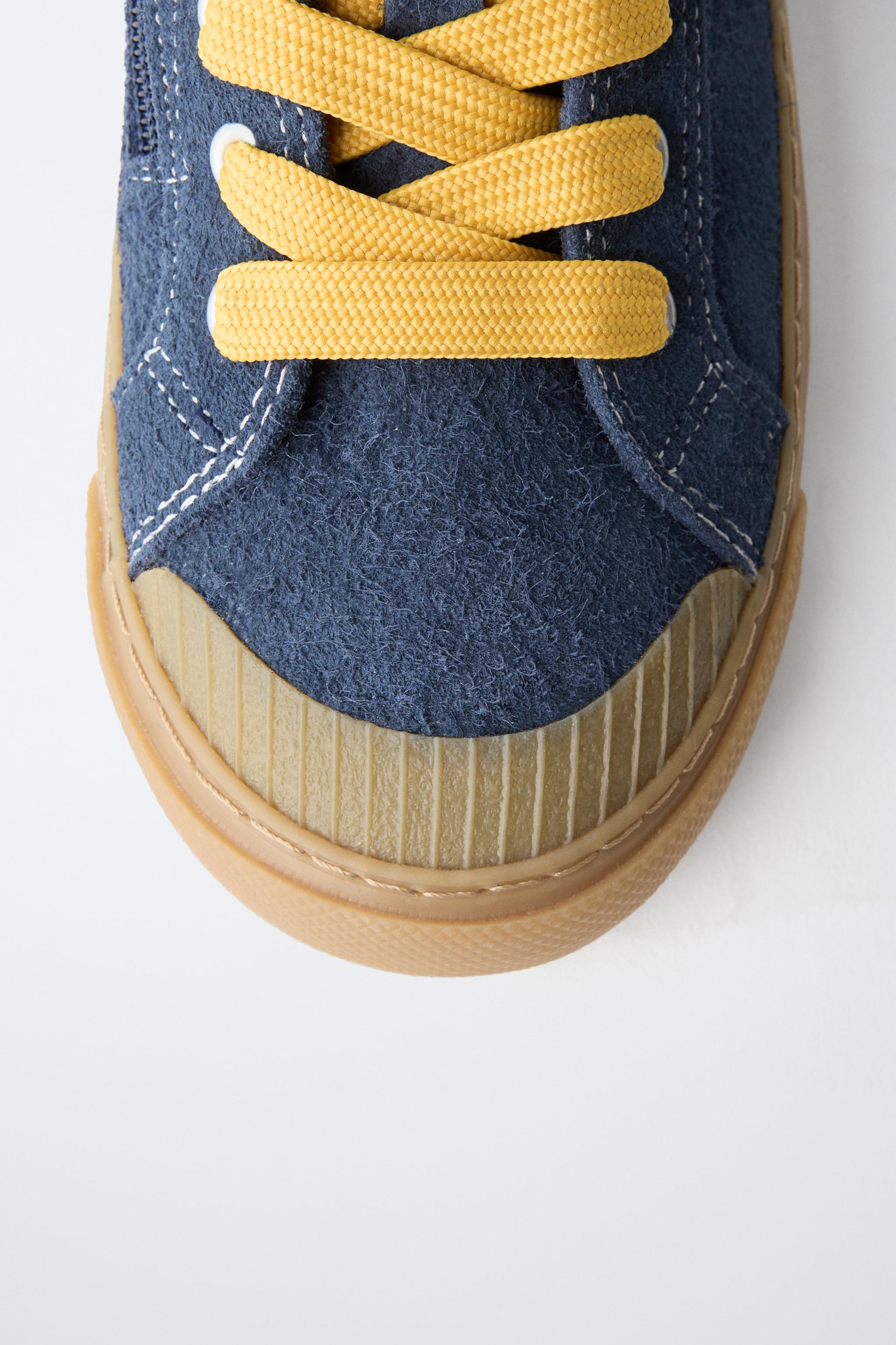 LEATHER HIGH-TOP SNEAKERS