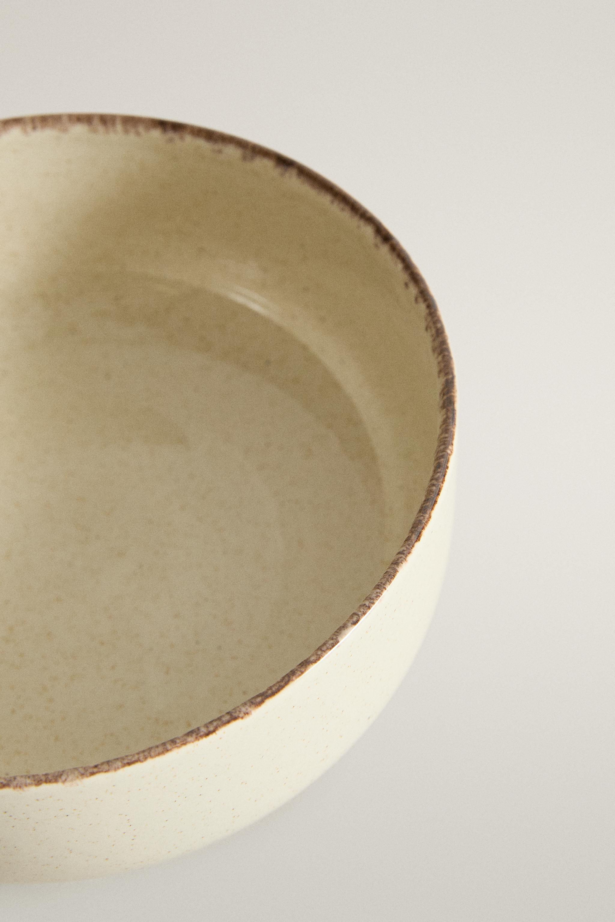 STONEWARE BOWL WITH AGED RIM