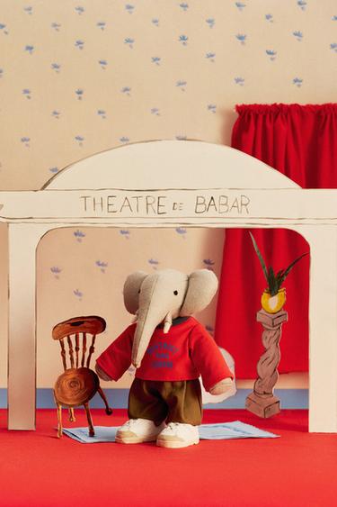 تيشرت بنص FLOCK - أحمر الخاص بـ Zara