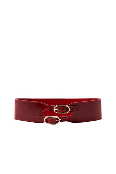 Front view of a red wide belt with double gold buckle.