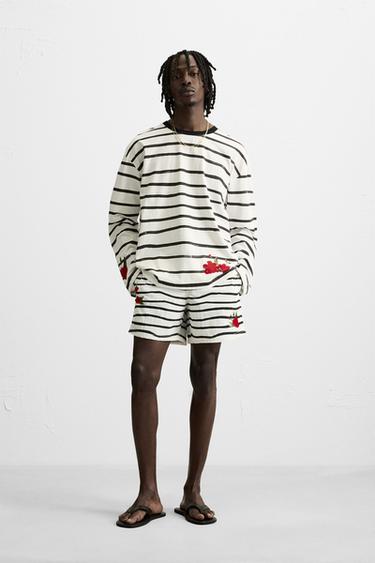 CONJUNTO BAÑADOR GRÁFICOS © OTIS KWAME KYE QUAICOE - Coral de Zara